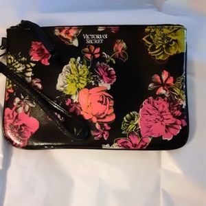 Victoria's Secret clutch bag or make up bag.